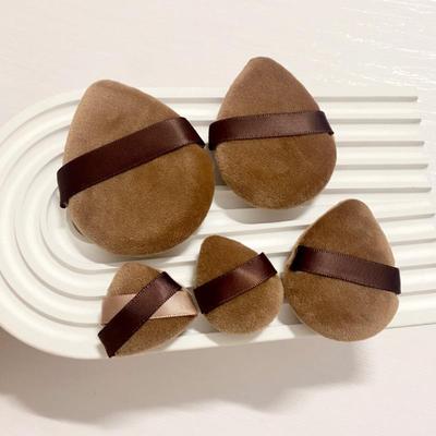 Brown Flocked Water Drop Powder Puffs: Loose Powder, Finger, Crystal Velvet, Highlighter, Blush, Setting Powder. Available In Large, Medium, Small.