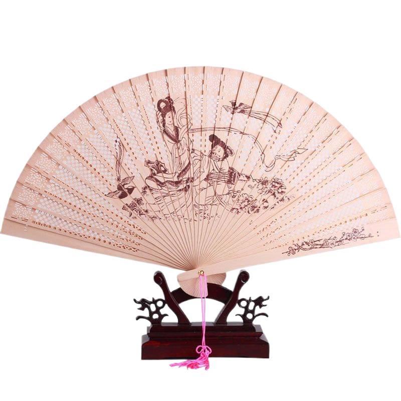 Antique-Style Chinese Sandalwood Folding Fan: Classic, Hollowed-Out Design for Women, Portable and Elegant.