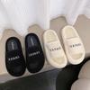 Thick-bottomed fluffy slippers women's high-end outer wear autumn and winter new home cotton slippers lamb wool one-word drag