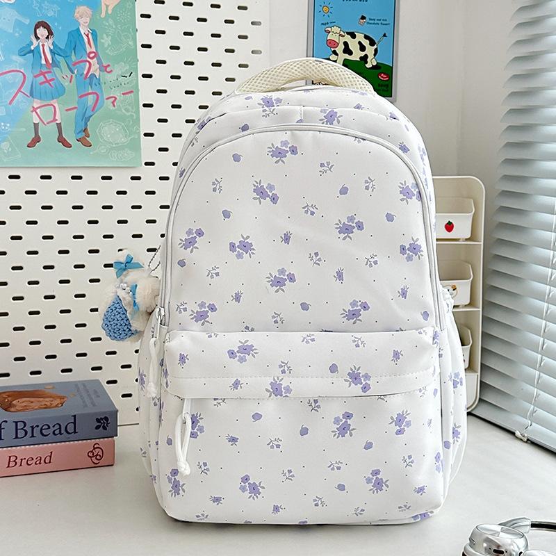 The new schoolbag is high-value, fresh and sweet floral backpack, and the lightweight spring outing backpack for junior high school students.