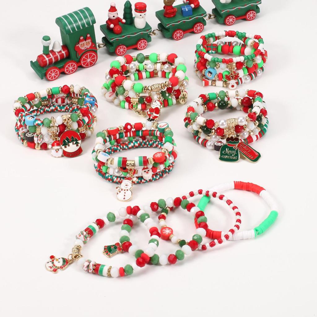 Christmas Charm Bracelet with Snowman, Tree, Santa, and Deer Pendants