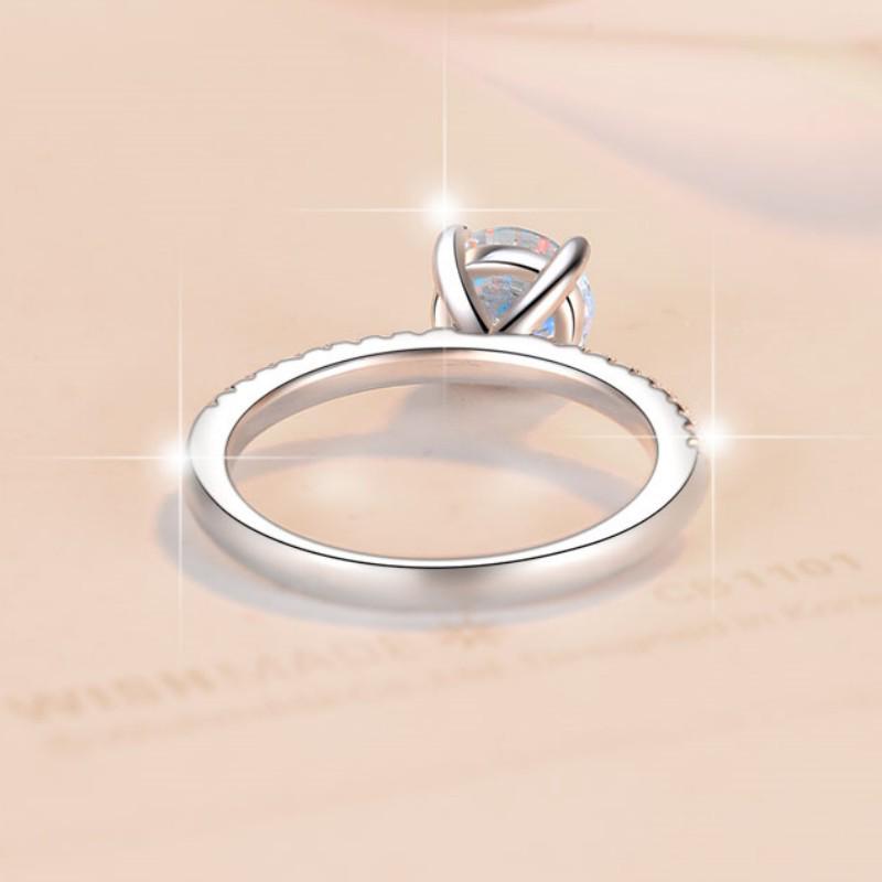 Women's Four-Prong Moissanite Ring In S925 Sterling Silver with Micro-Pave.