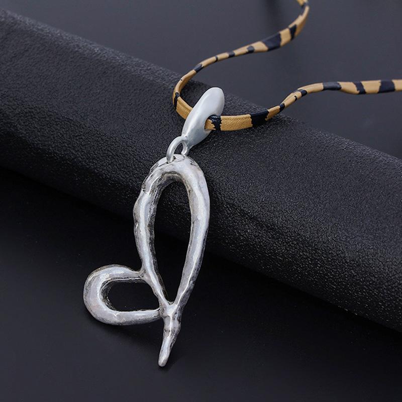 New women's necklace long high fashion retro personality trend pendant European and American