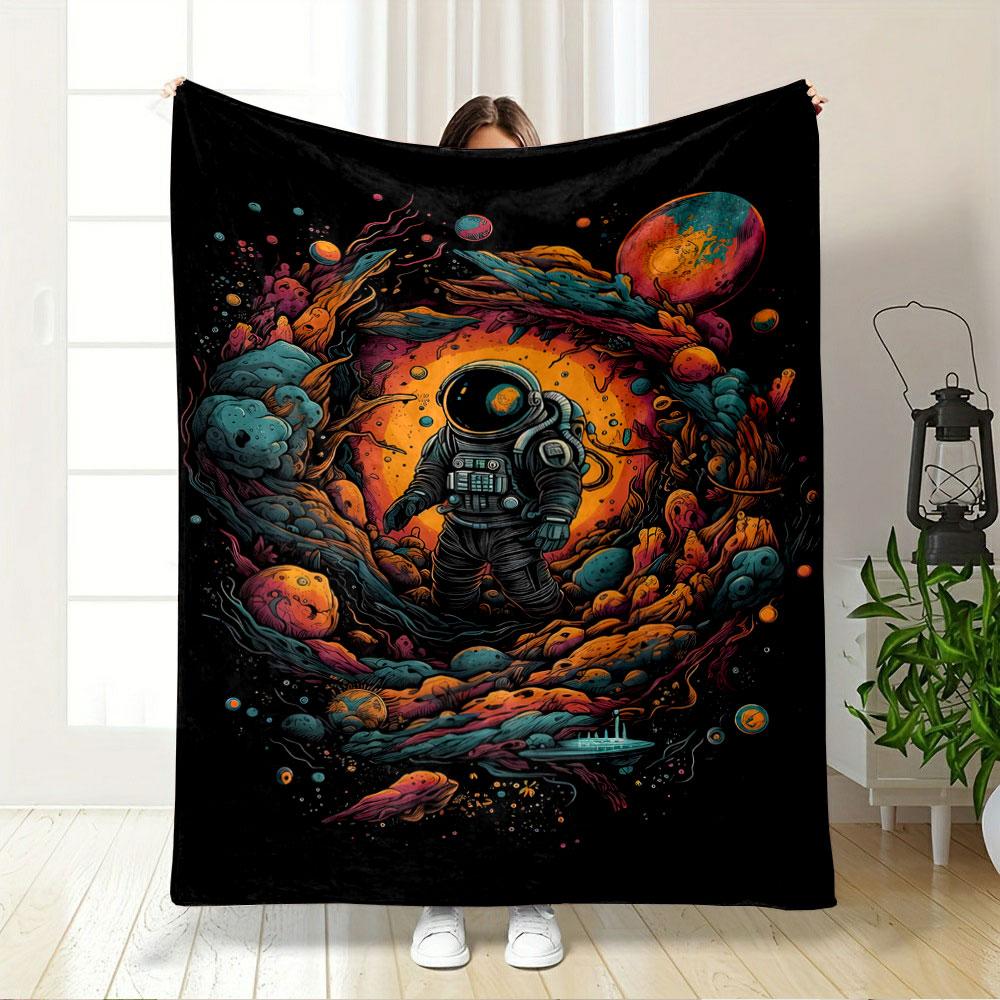Vibrant space scene with an astronaut surrounded by swirling cosmic forms. for all seasons blanket lunch break throw gift