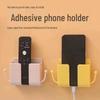 Wall-Mounted Charging Holder: Adhesive Phone Bracket for Bathroom, Kitchen, and Bedside Storage.
