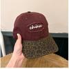 Korean retro-style leopard print baseball cap, a versatile and stylish accessory for women, offering sun protection and a color-blocked design that