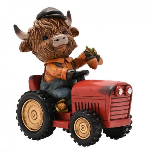 Country Living Highland Cow on Tractor