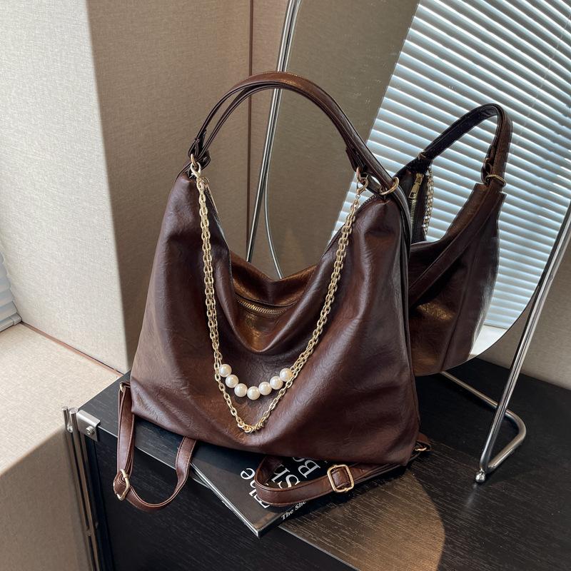 

Casual large-capacity bag women s new commuter versatile single shoulder messenger tote bag multi-purpose backpack темно-коричневого