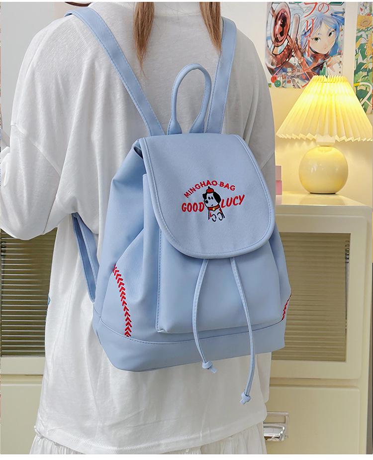 Japanese Student Casual Backpack with Embroidered Puppy Design, Drawstring Closure, and Matching Small Bag for Daily Use.