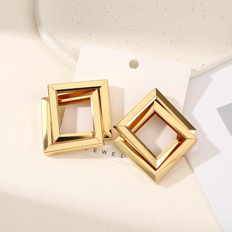 European and American jewelry simple fashion stud earrings texture double layer metal winding earrings geometric iron pipe earrings