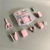 8pcs/set Portable Hole Punch, Staple Lifter, Tape Dispenser, Small Tape, Pencil Holder, Scissors And 500 #10 Staples.