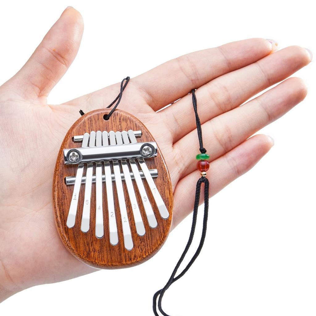 Mini Kalimba 8 Tangi Tumme Piano 1 Förpackning Vattendroppe Stil Sött Instrument Bärbar Utsökt Gåvoset för Barn