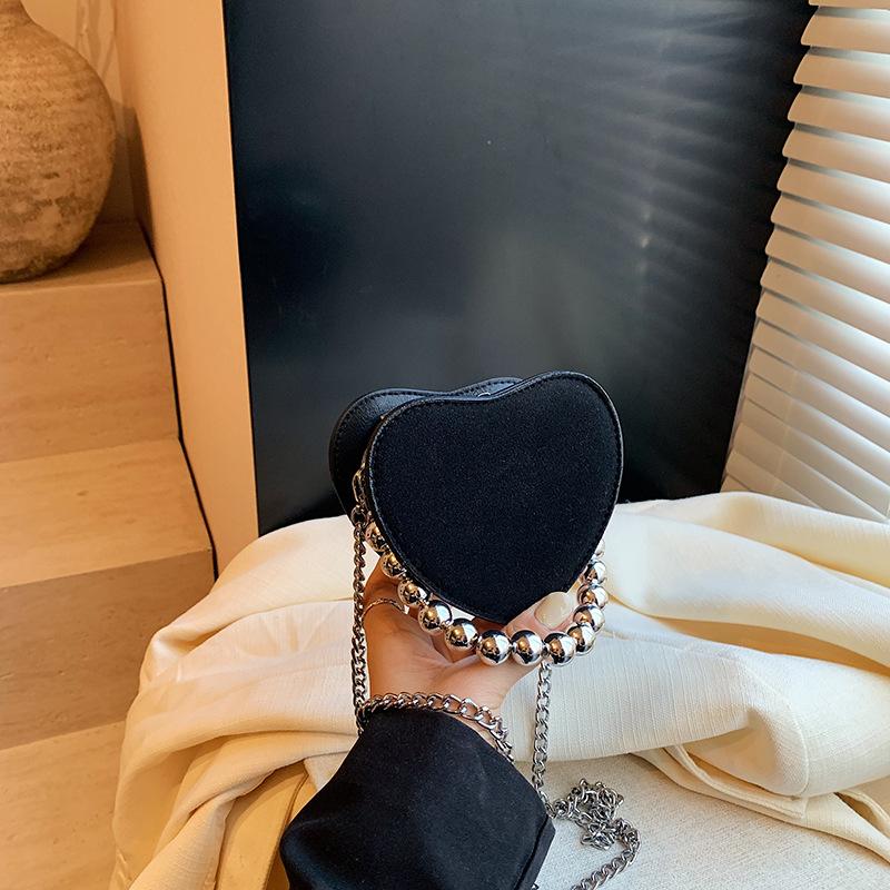 Herzförmige Umhänge-Schultertaschen für Damen Lippenstifttasche PU-Leder Mini-Clutch Münzbörse Herz Nische Messenger Bags