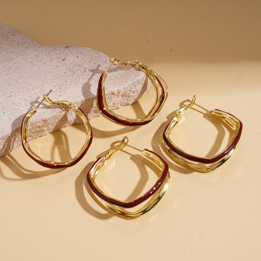 18k real gold electroplating dripping oil irregular geometric waves three-layer silver needle earrings retro simple earrings