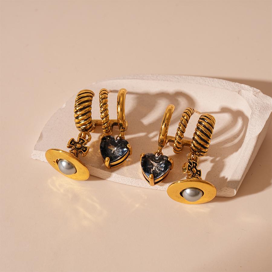Vintage Zircon Heart Saturn Silver Earrings: Stylish, High-End European and American Design for Women.