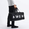 New Era Free Club Duffel Bag In Black with Side Logo (NELOGO WHI)