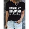 Women's "Raising My Husband Is Exhausting" Round Neck Short Sleeve Top for Casual Attire, Playful Design, Breathable Material, Statement Shirt