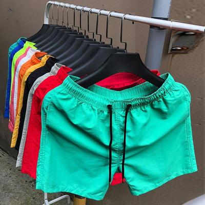 Short de plage couleur bonbon à séchage rapide pour homme - Vêtements de sport amples et tendance