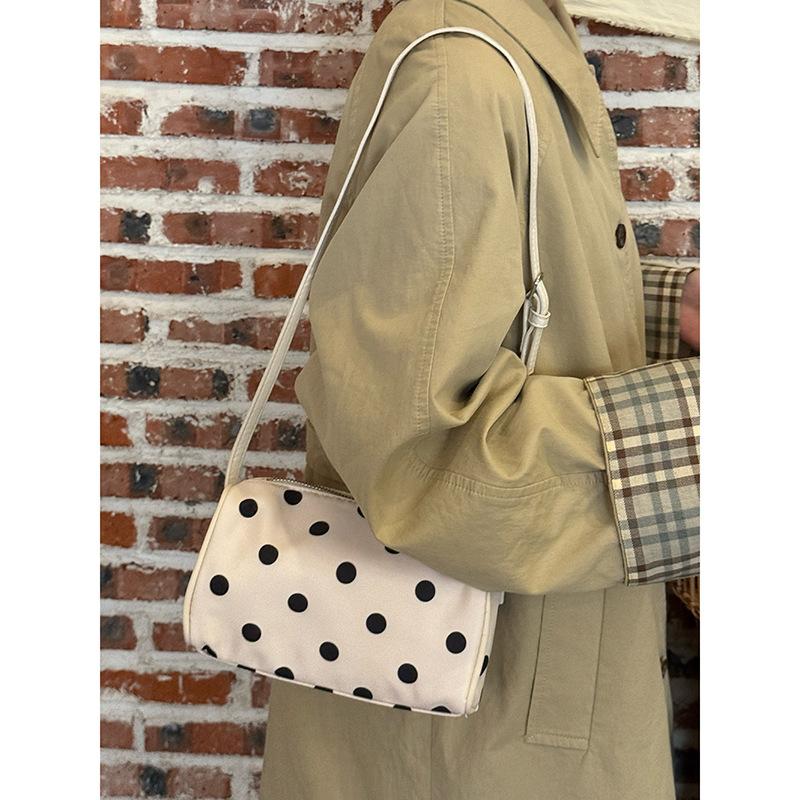 Korean polka dot toast handbag women's 2025 new niche design shoulder bag high value versatile armpit bag