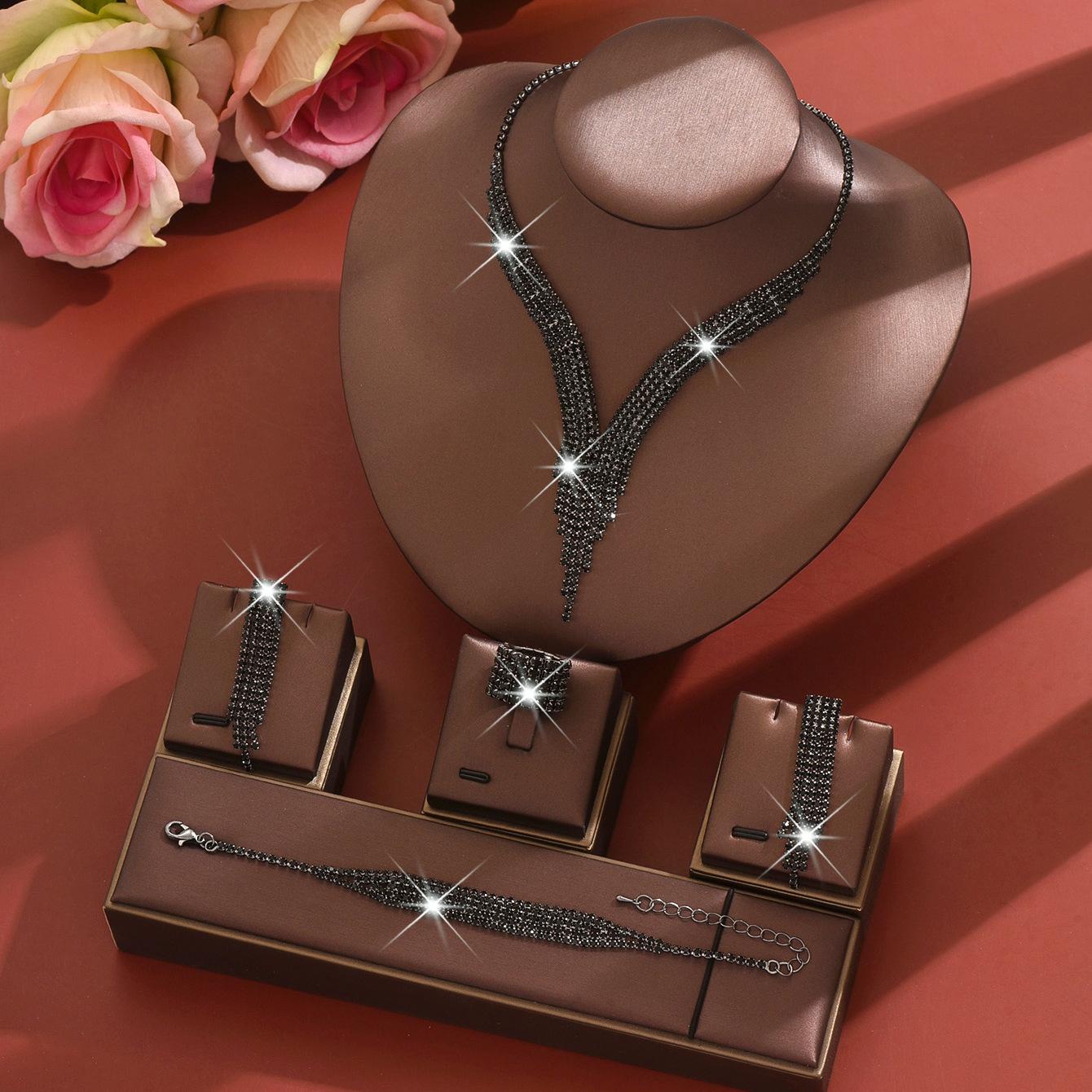 

Дизайн Чувство Полный Бриллиант Супер Вспышка Кисточка Ожерелье, Серьги, Браслет Набор Ювелирных Изделий Свадебный Набор Ювелирных Изделий