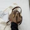 Retro Semi-round Soft Leather Rivet Corner Commuting Niche Texture Handbag