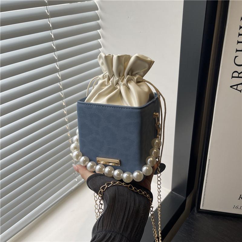 Hand Carry Pearl Bucket Bag Women's New Autumn Simple Fashion Shoulder Bag Niche High-end Textured Messenger Bag