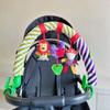 Infant Stroller Attachment With Sound And Visual Stimulation For Baby Engagement