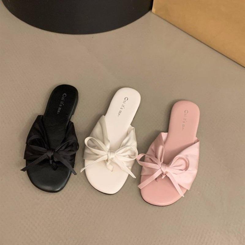 Gentle flat-bottomed bow toe slippers women's summer wear fashion soft-soled one-word holiday sandals
