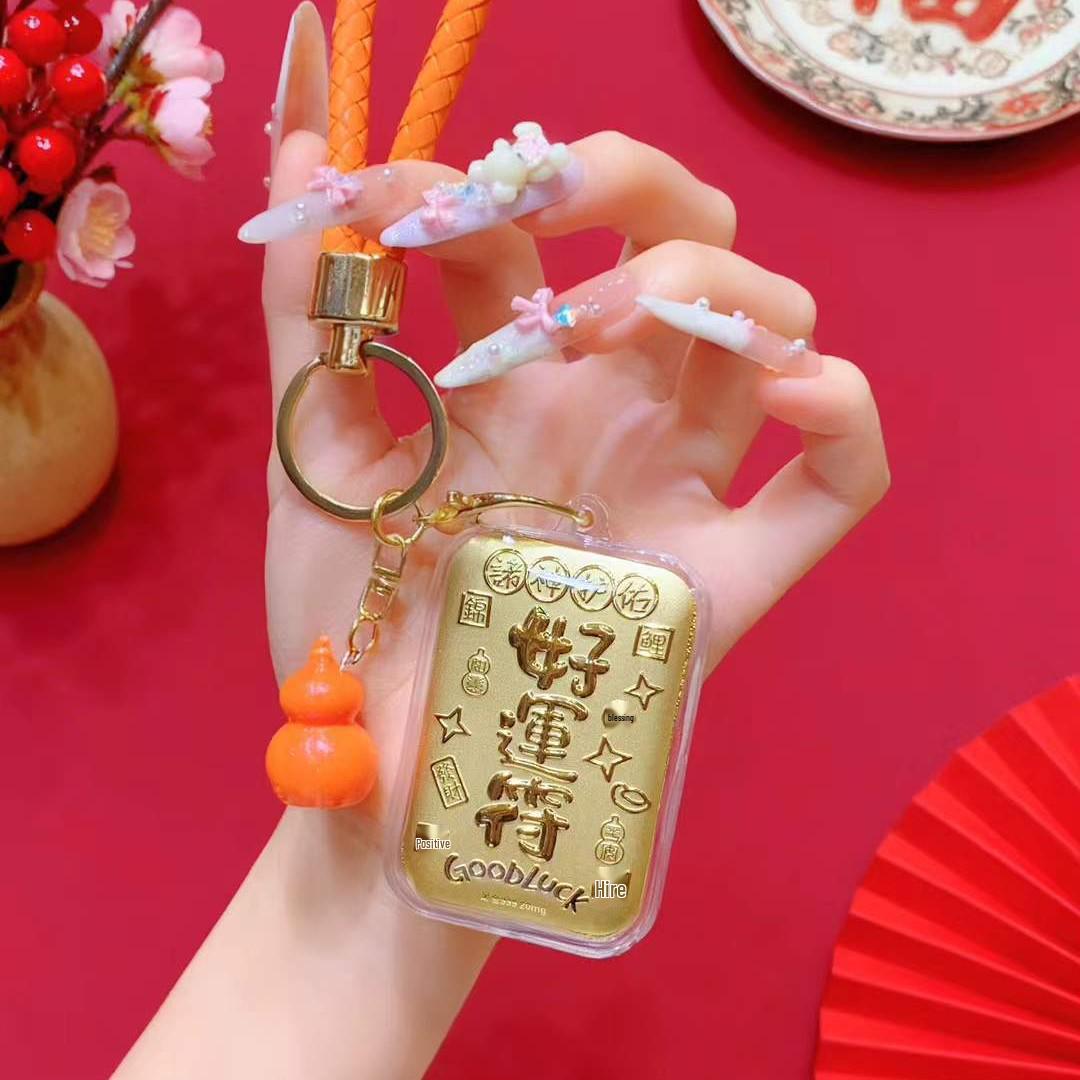 

Golden Prosperity Phone Pendant: Pure Gold Keychain with Auspicious Gift Bag and Buckle.