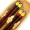 A pair of matching chopsticks featuring a golden owl presented in a paulownia wood A perfect gift for wedding anniversaries wedding Respect for the