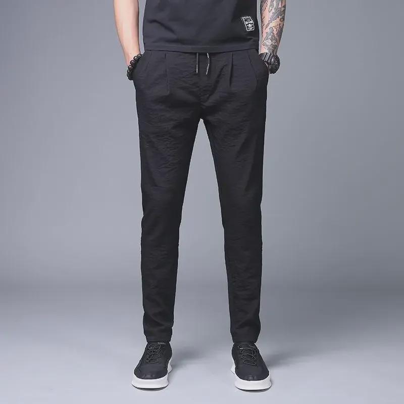 2023 Men's Loose Ice Silk Pants: Lightweight Korean-Style Trendy Summer Casual Straight Nine-Point Trousers.