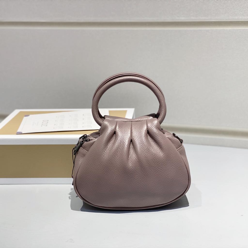 Bolsa Feminina de Couro Genuíno 2025 Nova Retrô Couro Bovino Camada Superior Bolsa de Mão Simples Versátil Tote Fabricante
