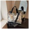 Embroidered canvas bag women's large-capacity new summer versatile messenger bag college student commuter tote bag