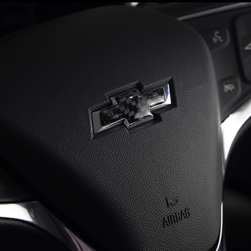 Vhzk10 Car Steering Wheel Center Emblem Sticker for Chevrolet Cruze Spark Aveo Sail Orlando Sonic Corvette Orlando Cobalt Malibu Trax