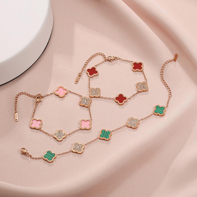 

18K Розовое золото Четырехлистовая трава Титановая сталь Браслет Женский полный бриллиант Мода Неувядающий ручной орнамент Темперамент Ювелирные изделия