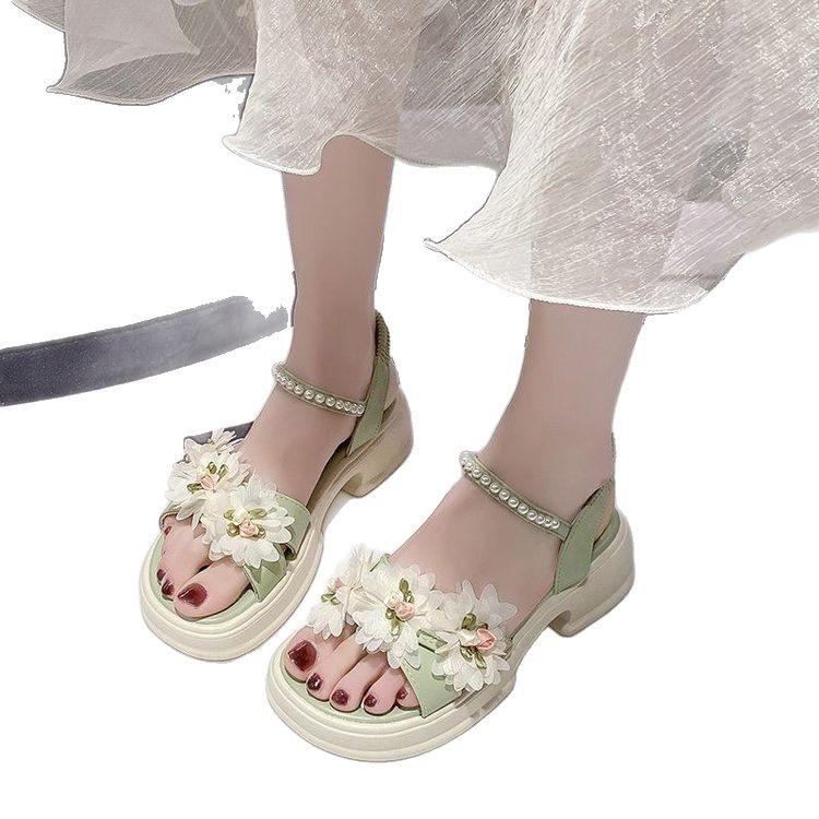 Fairy wind sandals female skirt 2025 new summer muffin platform flower beach shoes Internet celebrity Roman shoes tide