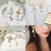 Boucles d'oreilles éventail style ancien Fleur de chat avec pompons asymétriques pour femmes