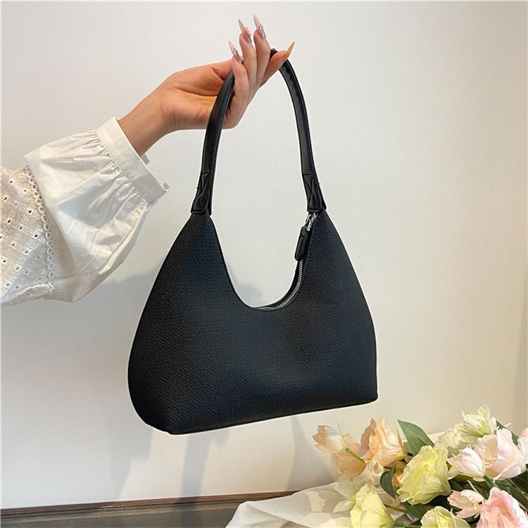 

Leisure commuting large-capacity bag women s summer new armpit bag niche portable shoulder bag чорний
