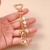 Aihua Cute Y2K Metal Pearl Love Heart Bowknot Key Chain for Women Girl Handbag Pendants DIY Key Ring Handmade Jewelry Gifts