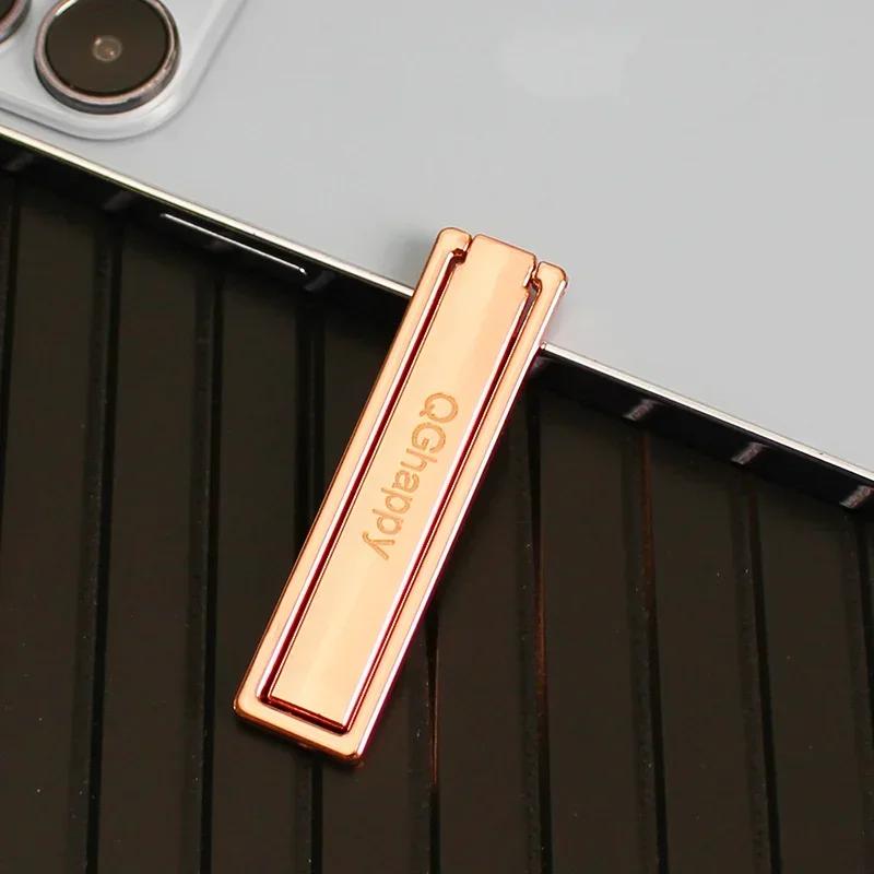 

Мини-держатель для мобильного телефона из алюминиевого сплава, складной, регулируемый, портативный, с наклейкой на заднюю панель для iPhone13 14 Xiaomi Huawei ярко-розовый