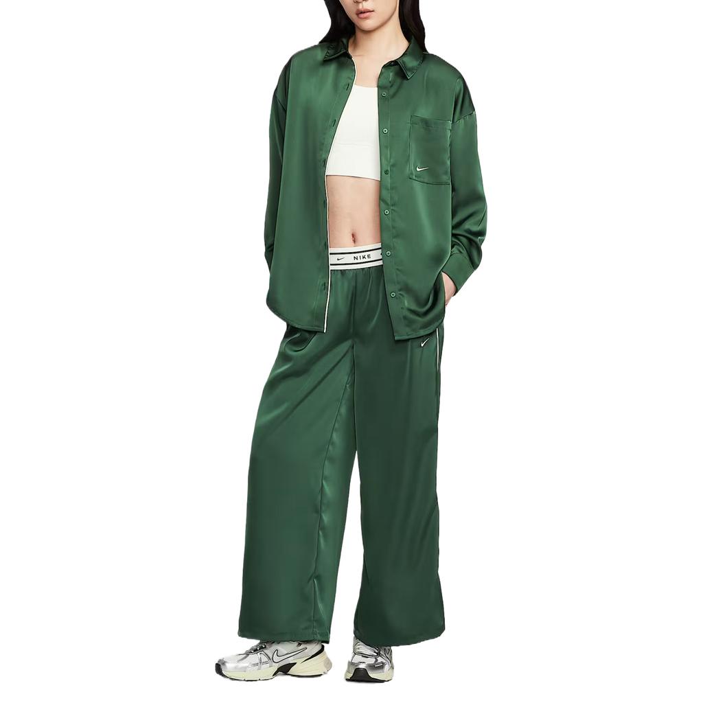 Nike Pantaloni Sportivi da Donna in Maglia Elasticizzata Satinata con Vita Comoda, Colore Unito IH1327-323