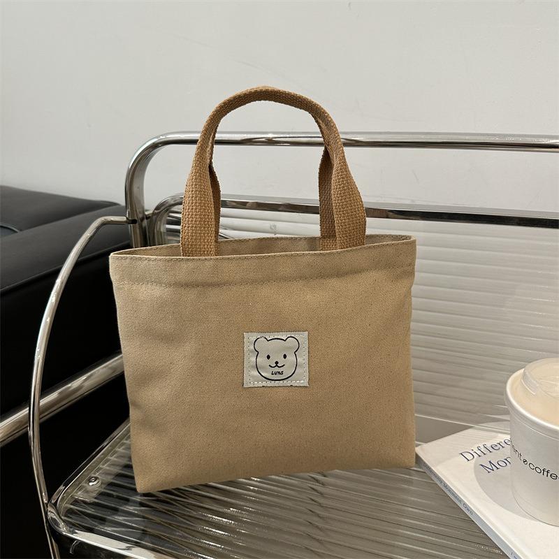 Women's bag niche design canvas tote bag Bento bag versatile commuter portable to work portable small