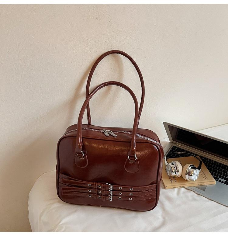 

Korean niche underarm briefcase women s 2025 new retro fashion large-capacity commuter shoulder bag коричневый