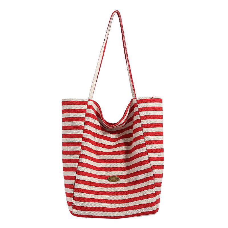 Niche high-value double-sided striped canvas bag 2025 new large-capacity casual versatile commuter shoulder tote bag