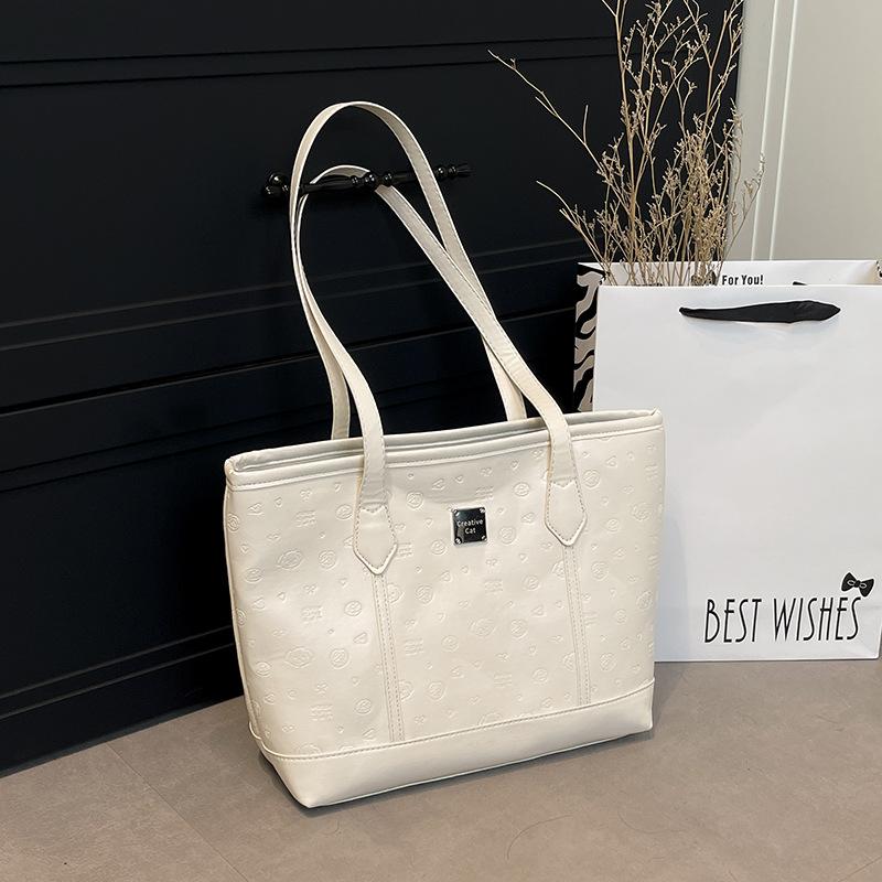 Европейская и американская простая вместительная сумка-тоут 2026 года новая высококачественная повседневная и милая тисненая плечевая сумка