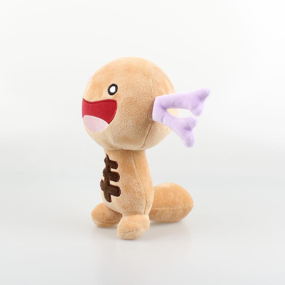 Il Peluche Wooper di Paldea È Un Peluche Carino Realizzato Nei Colori Rosso E Viola