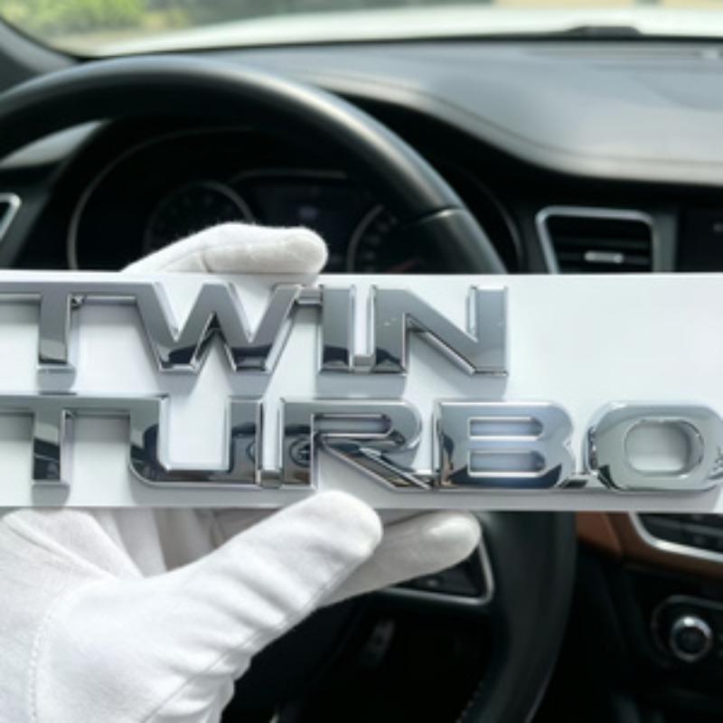 TWIN TURBO Dual-turbo car emblem Gloss black/gloss silver 3D modified badge delivering an aggressive performance aesthetic to the rear of the vehicle