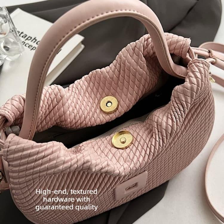 Bolsa de ombro feminina elegante com textura