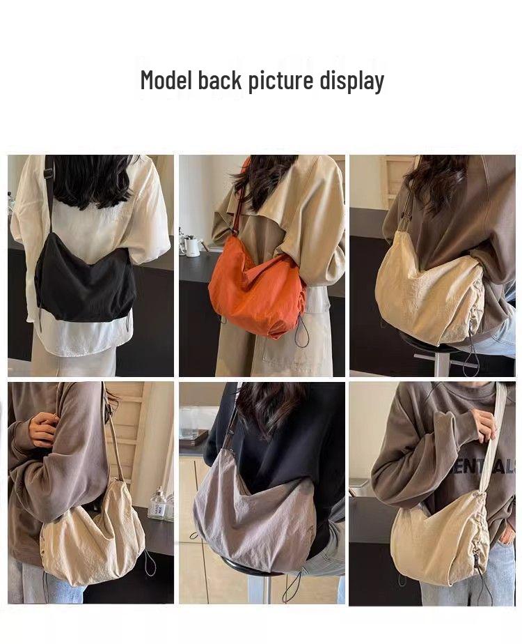 Japanese-Style Waterproof Nylon Dumpling Crossbody Bag: Sporty, Large-Capacity Tote for Men & Women, Ideal for Cycling & Relaxed Shoulder Wear.