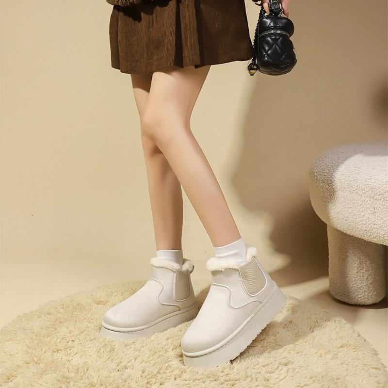 Autumn and winter snow boots women's 2025 new thick-soled thickened thermal cotton shoes with one foot pedal solid color short tube cold-proof boot